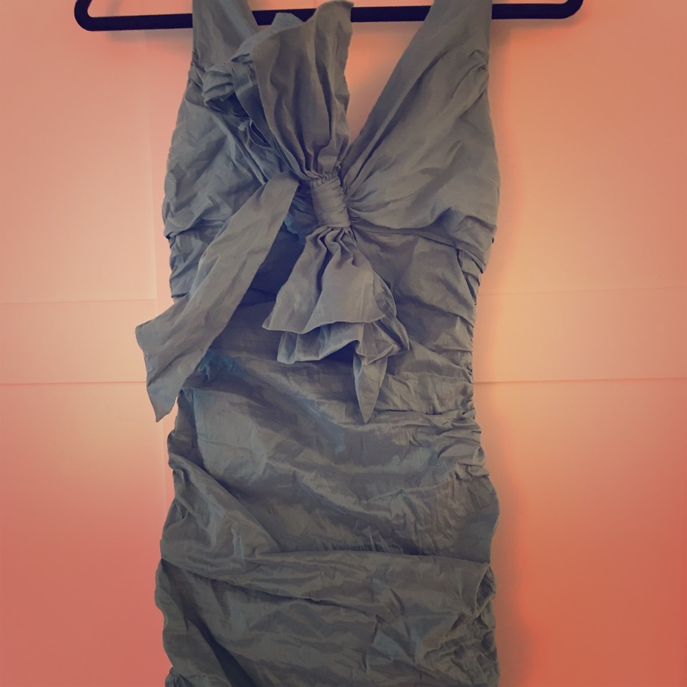 Cocktail dress Ruching on sides and back.